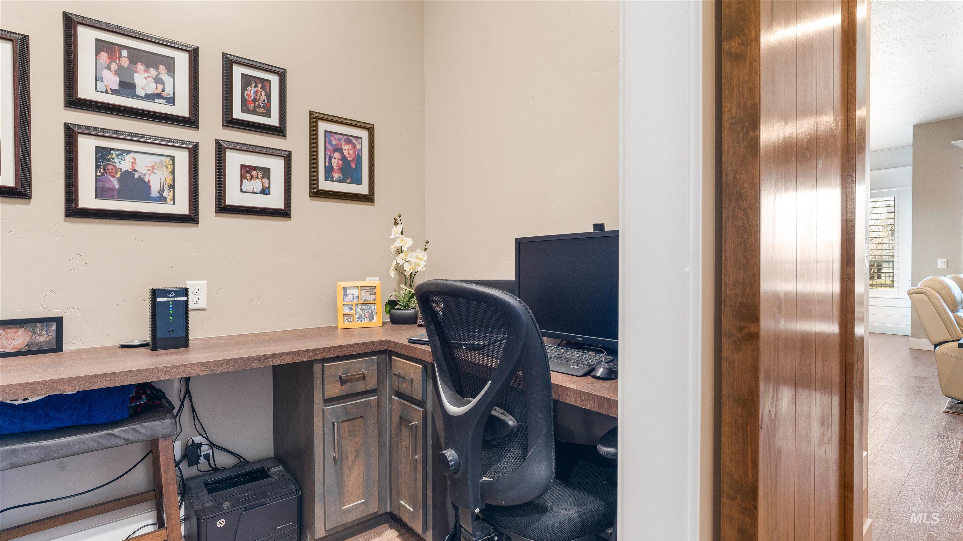 4676 South Abbot Meridian, ID 83642 - Photo 45 of 49 Office area with built in study area and light wood-style floors