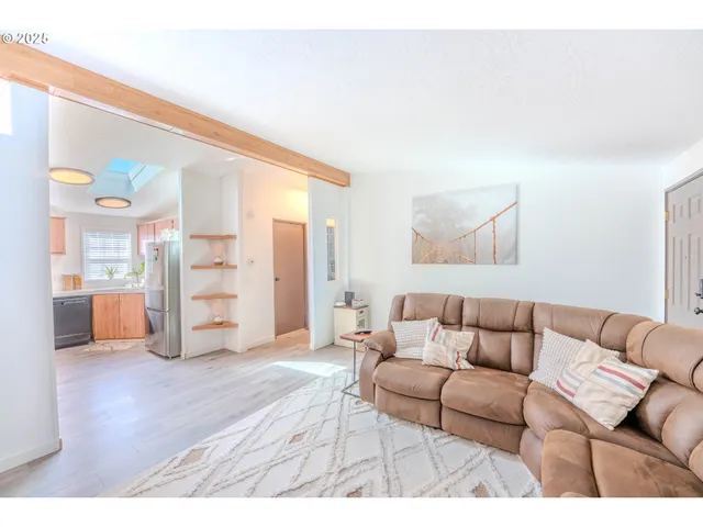 a kitchen with a table and chairs in it