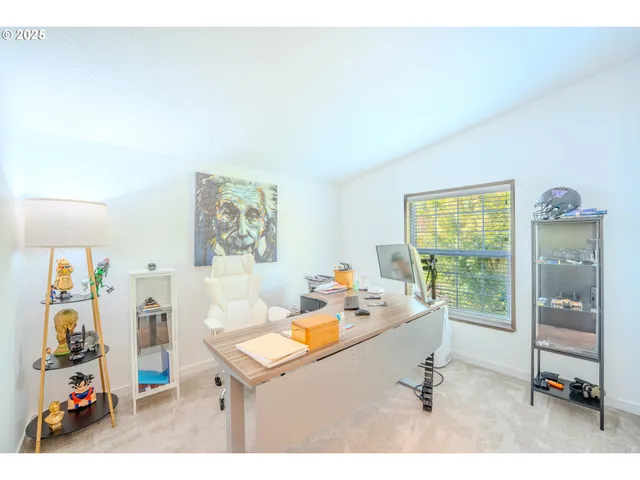 a view of workspace with livingroom view