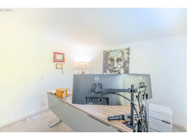 a view of a house with backyard