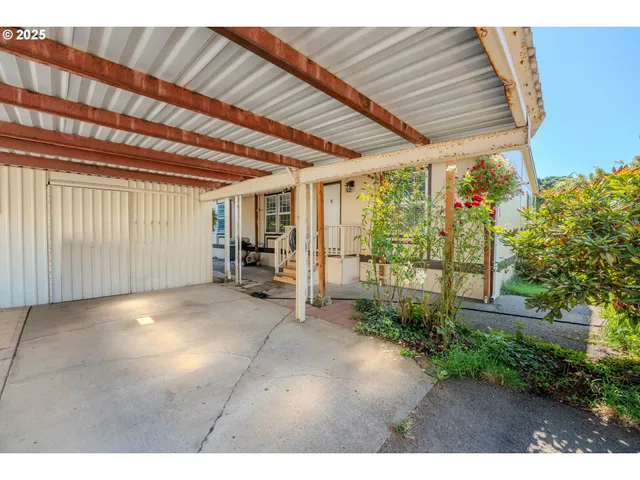 a backyard of a house with seating space