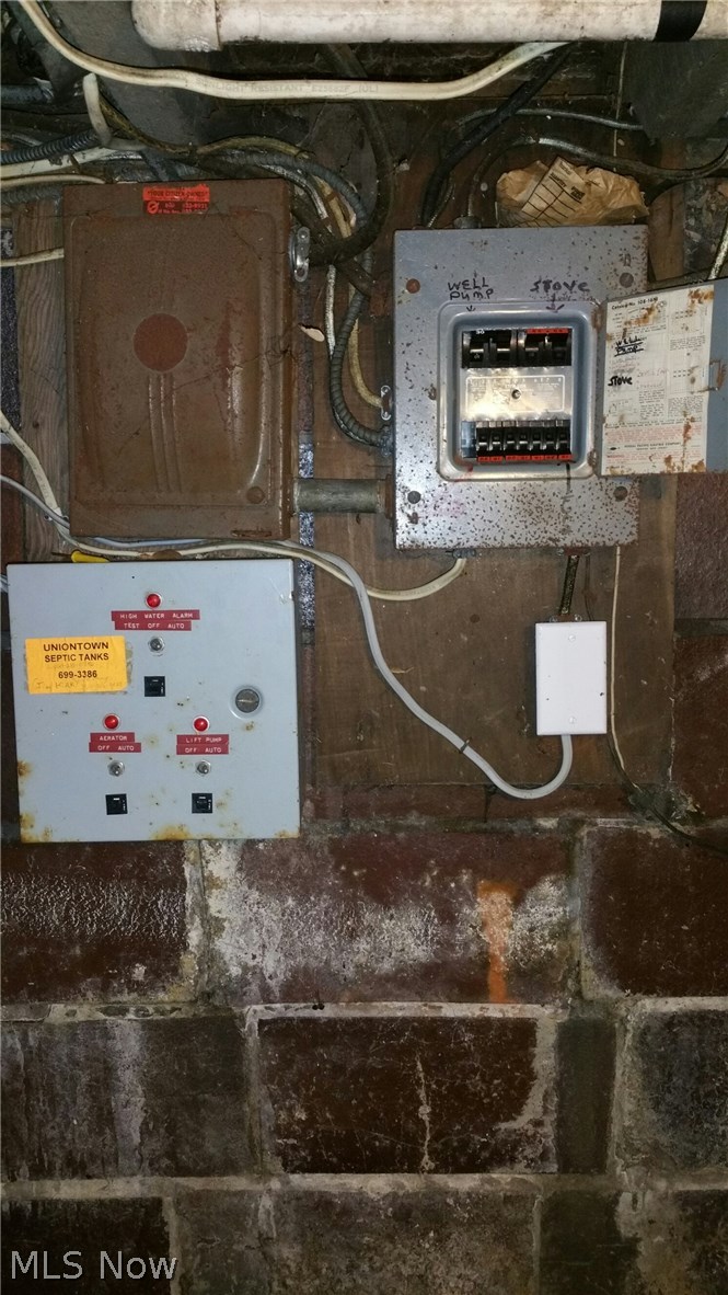 6308 Wayland Road Ravenna, OH 44266 - Photo 20 of 22 View of 60 amp breaker box in house basement.