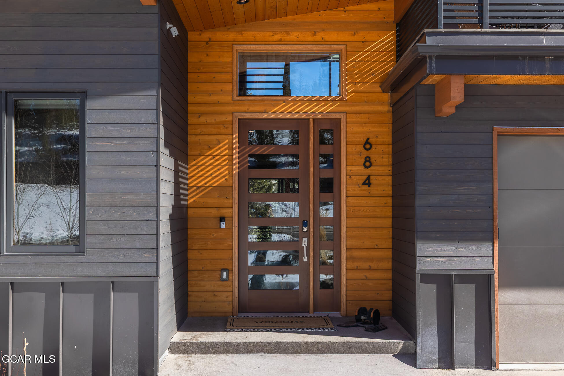 684 Vasquez Road Winter Park, CO 80482 - Photo 3 of 45 a front view of a house with a window