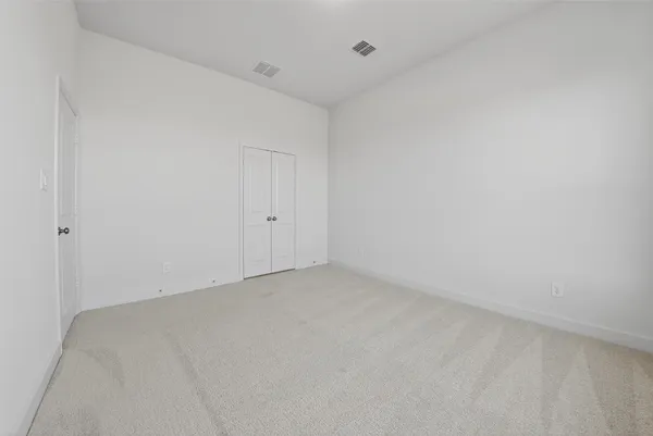 a bathroom with a double vanity sink mirror and shower
