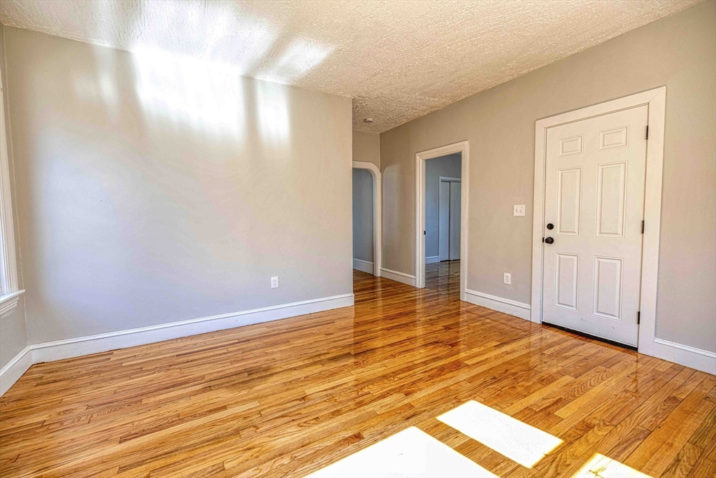 66 Lyon Street, Unit 1 Fall River, MA 02721 - Photo 6 of 11 a view of an empty room