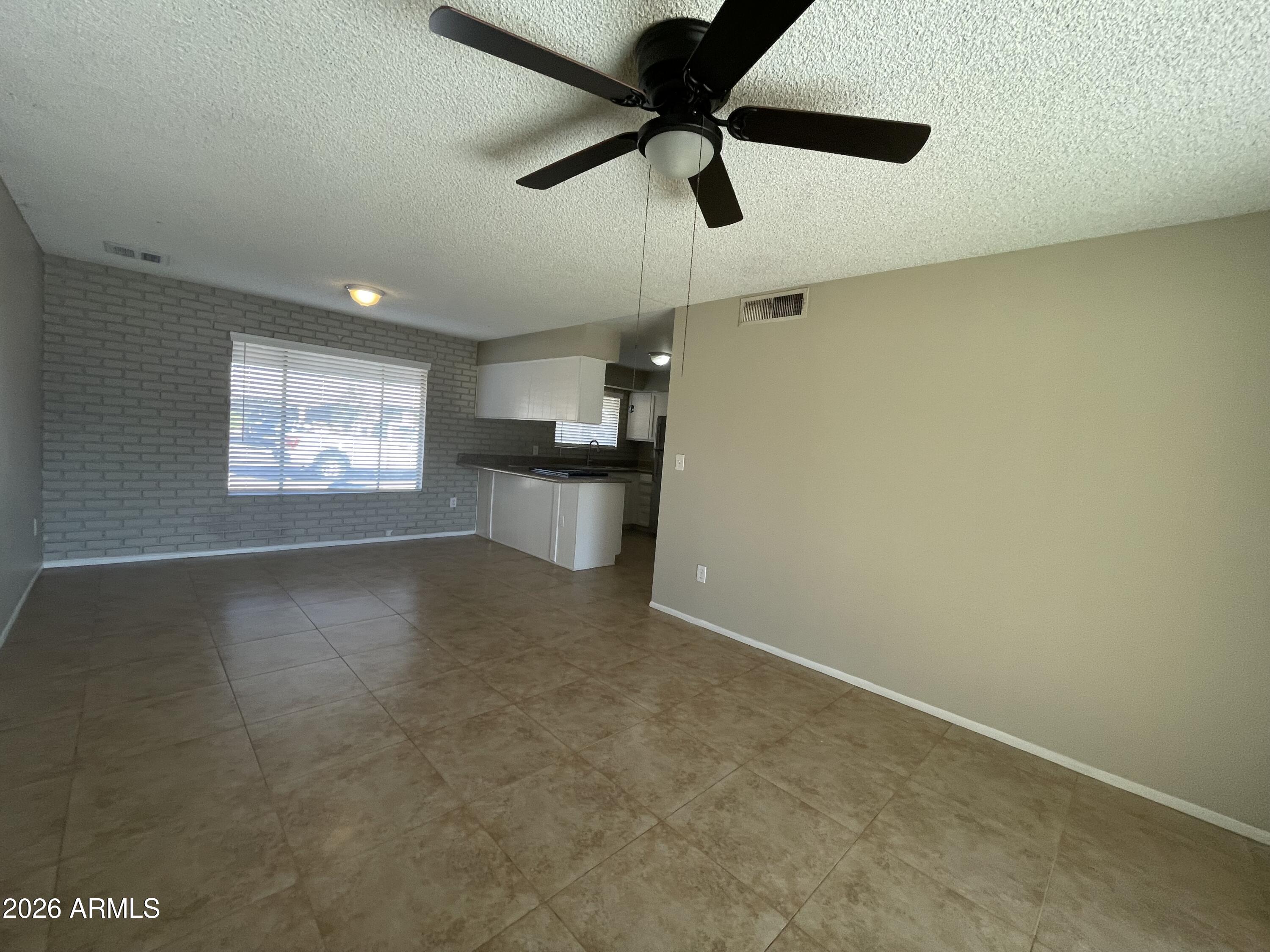 5337 West Berkeley Road Phoenix, AZ 85035 - Photo 9 of 20 View to kitchen