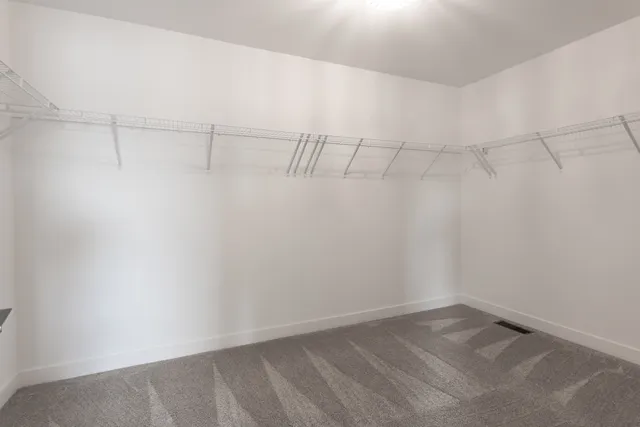 a view of a room with racks on the wall