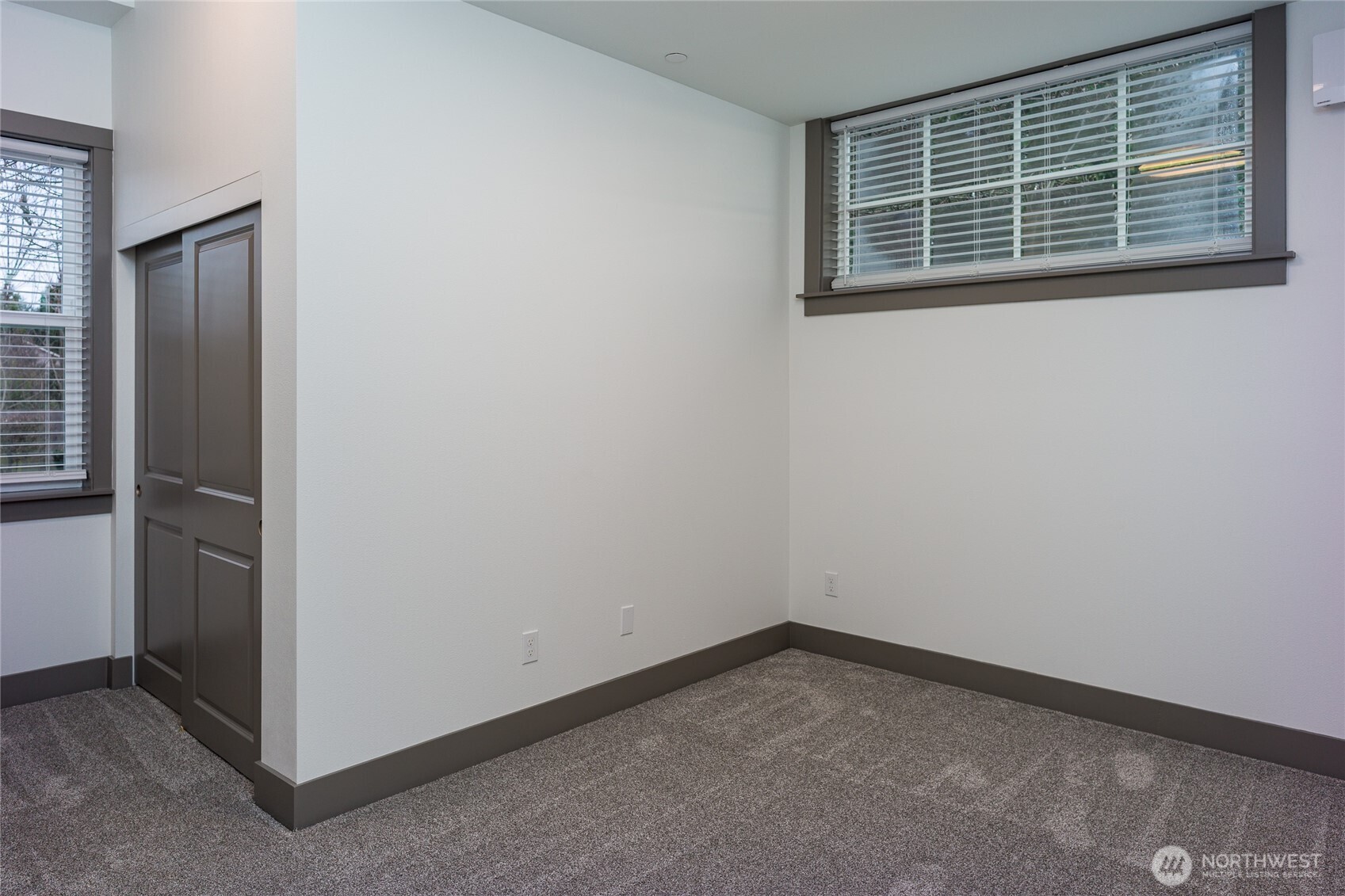 623 Morris Street, Unit E2 La Conner, WA 98257 - Photo 17 of 29 a view of empty room with windows