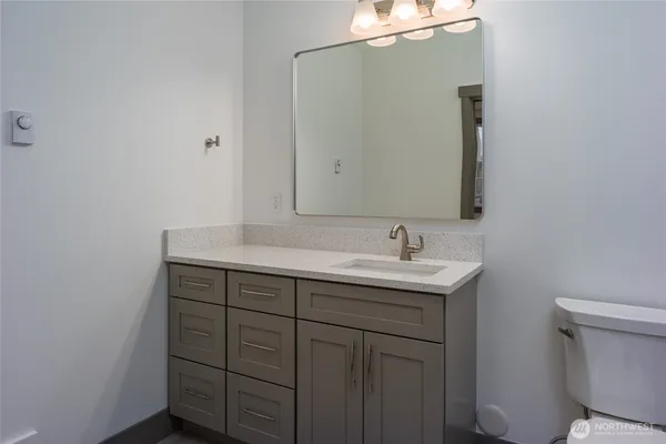 a bathroom with a sink and a toilet