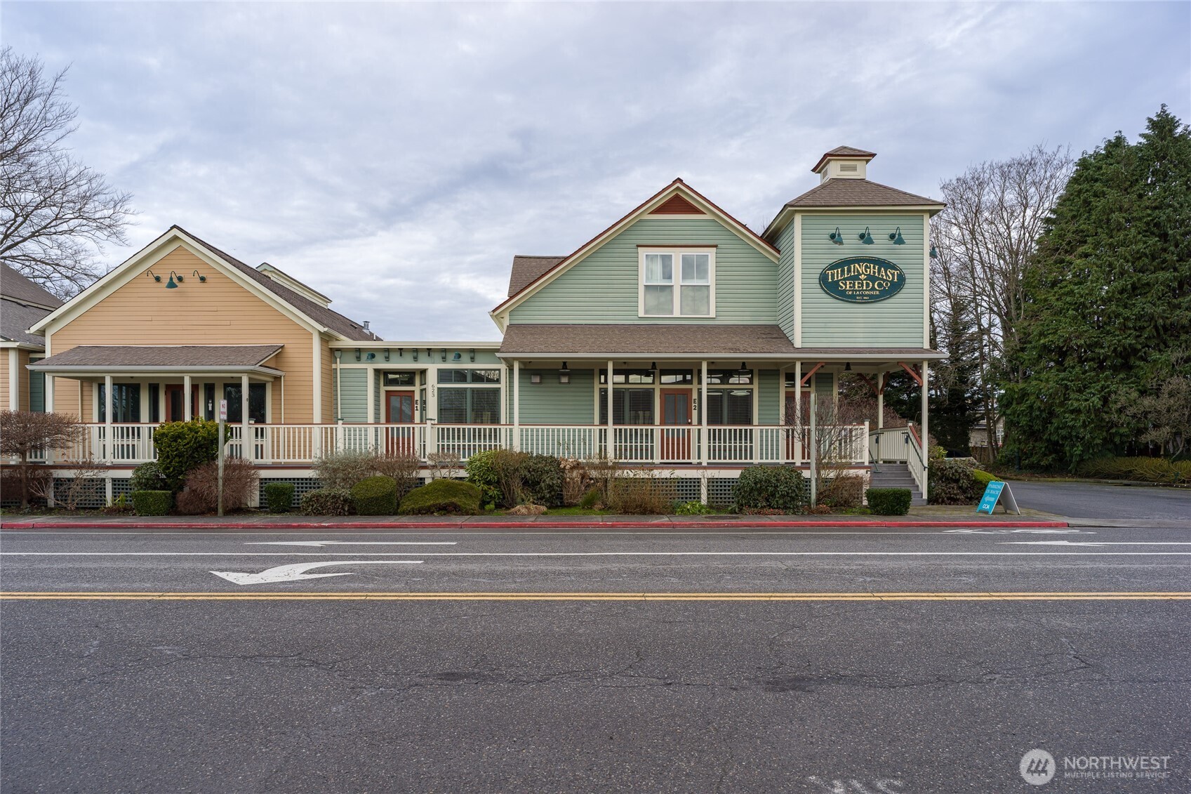 623 Morris Street, Unit E2 La Conner, WA 98257 - Photo 29 of 29 a front view of a house with a garden