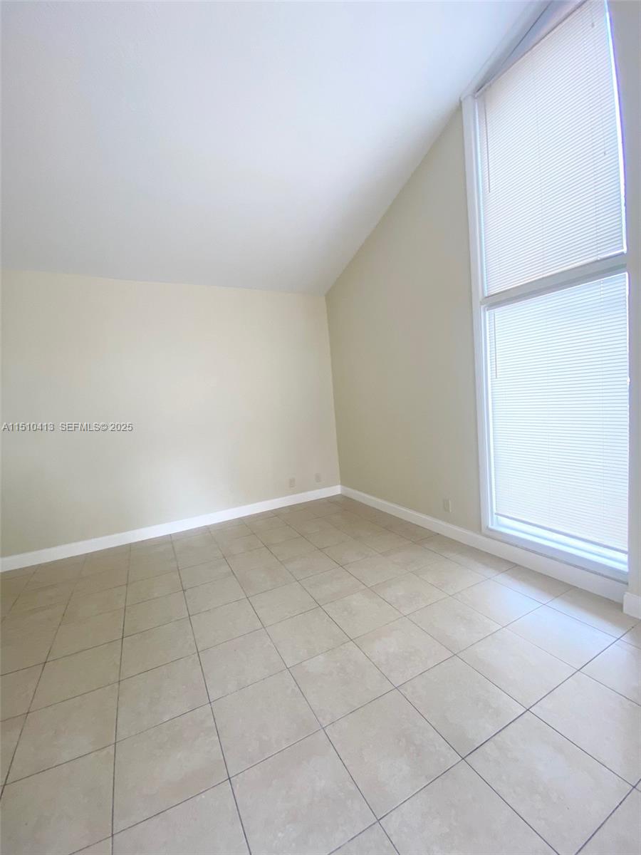 7351 West Sunrise Boulevard, Unit 7351 Plantation, FL 33322 - Photo 11 of 44 a view of an empty room