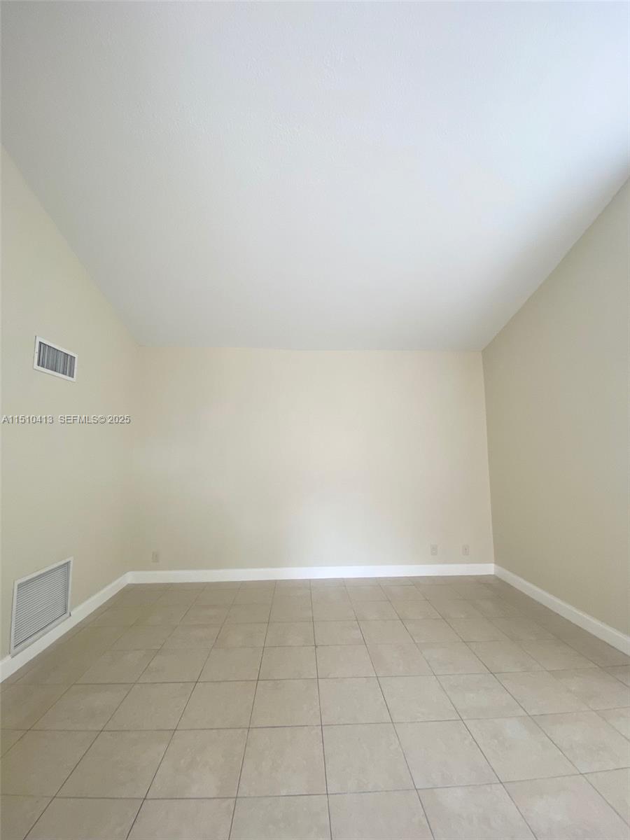 7351 West Sunrise Boulevard, Unit 7351 Plantation, FL 33322 - Photo 32 of 44 a view of an empty room
