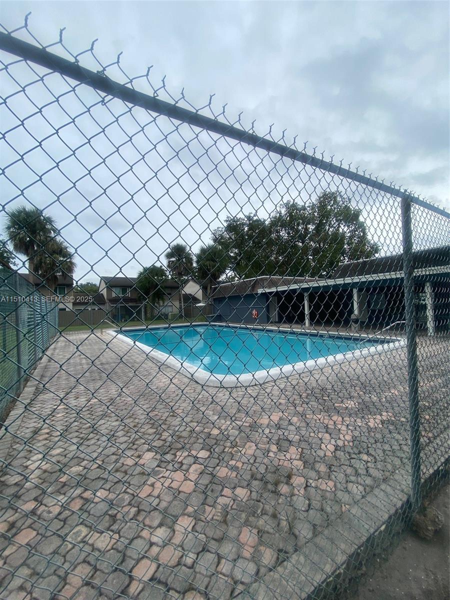 7351 West Sunrise Boulevard, Unit 7351 Plantation, FL 33322 - Photo 41 of 44 a view of a backyard