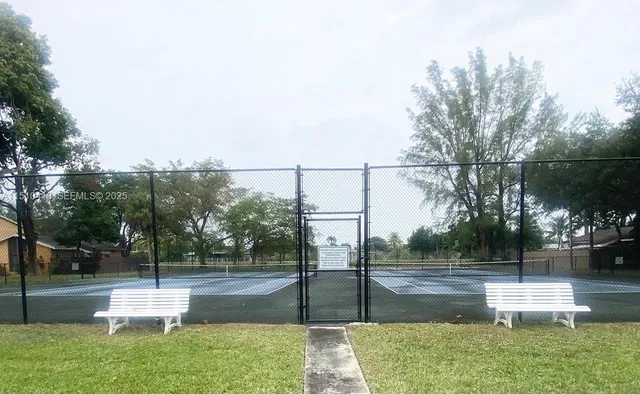a view of swimming pool from a yard