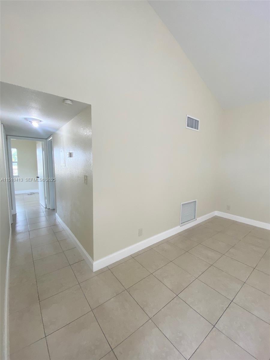 7351 West Sunrise Boulevard, Unit 7351 Plantation, FL 33322 - Photo 10 of 44 a view of an empty room