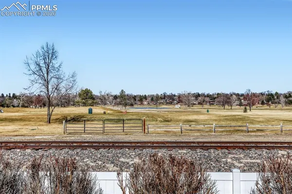 a black white wall with view of bathroom