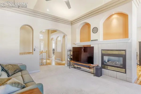 a living room with furniture and a window