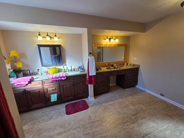 a front view of a house with a large window