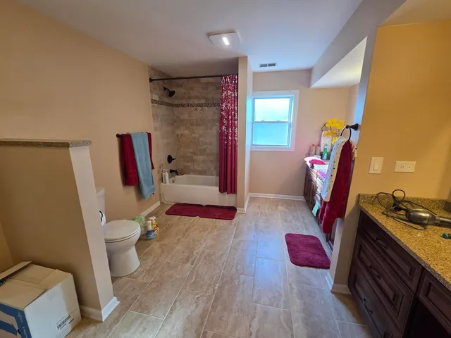 a view of livingroom with furniture and wooden floor