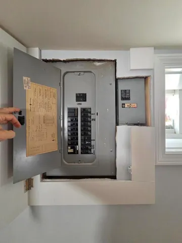 a bathroom with a sink toilet and a mirror