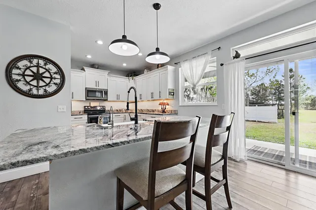 a view of a yard with an outdoor space