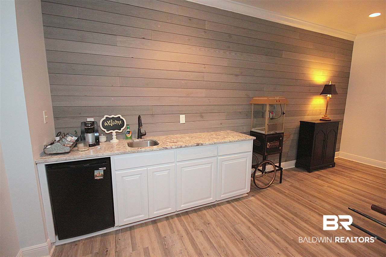8032 Pine Run Daphne, AL 36527 - Photo 32 of 50 Basement Mini Fridge Bar