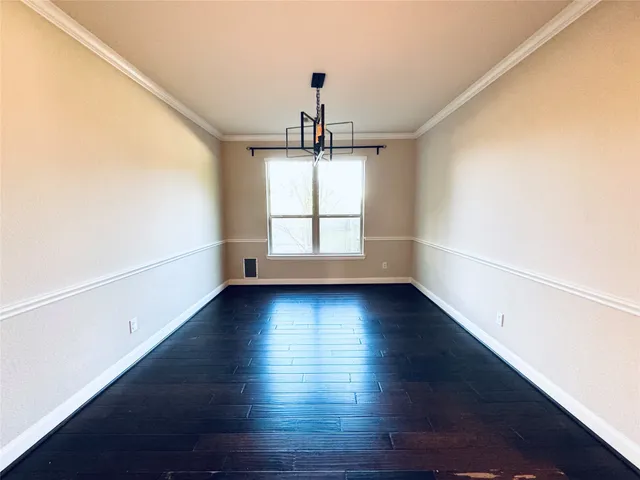 a en suite bathroom with a tub sink and mirror