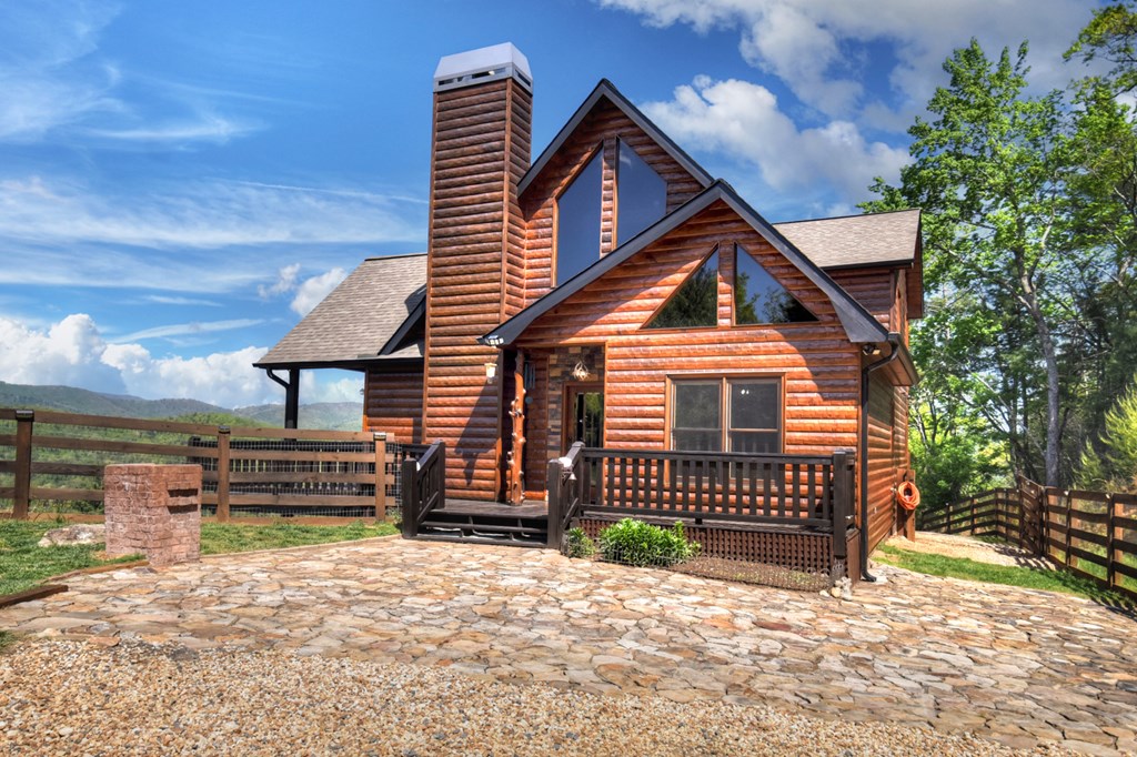 459 Quail Ridge Road Epworth, GA 30541 - Photo 33 of 73 a front view of a house with a yard