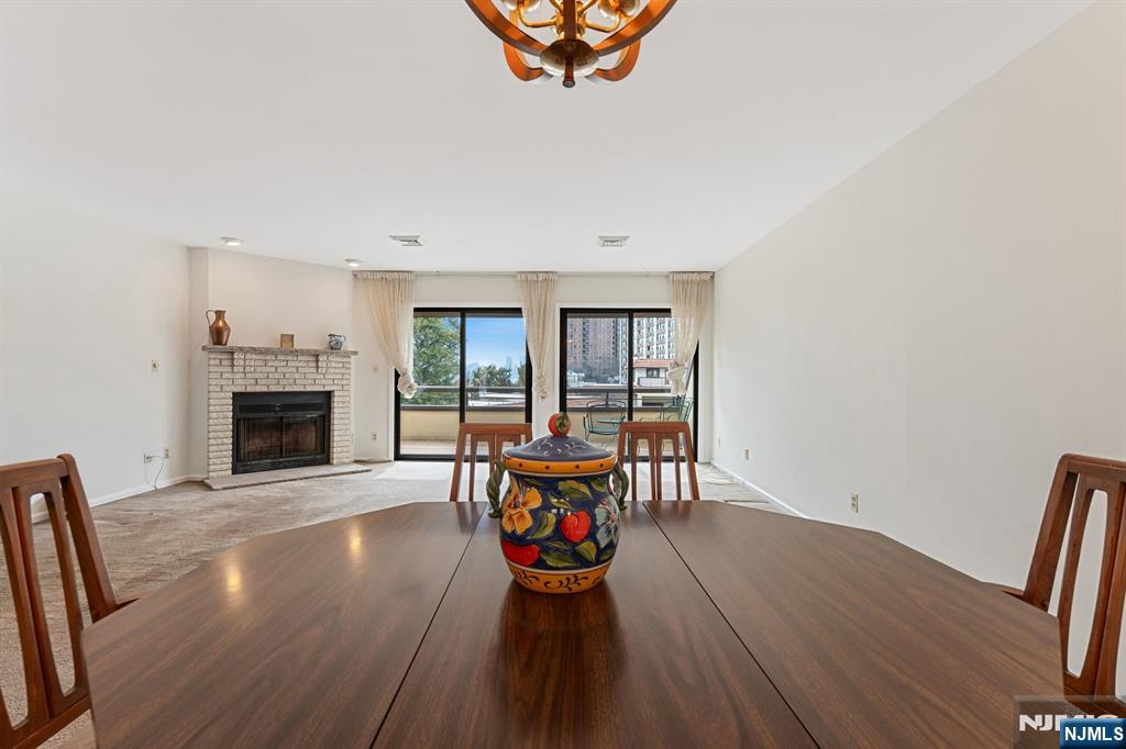 300 Gorge Road, Unit 25 Cliffside Park, NJ 07010 - Photo 15 of 45 a living room with furniture and a fireplace