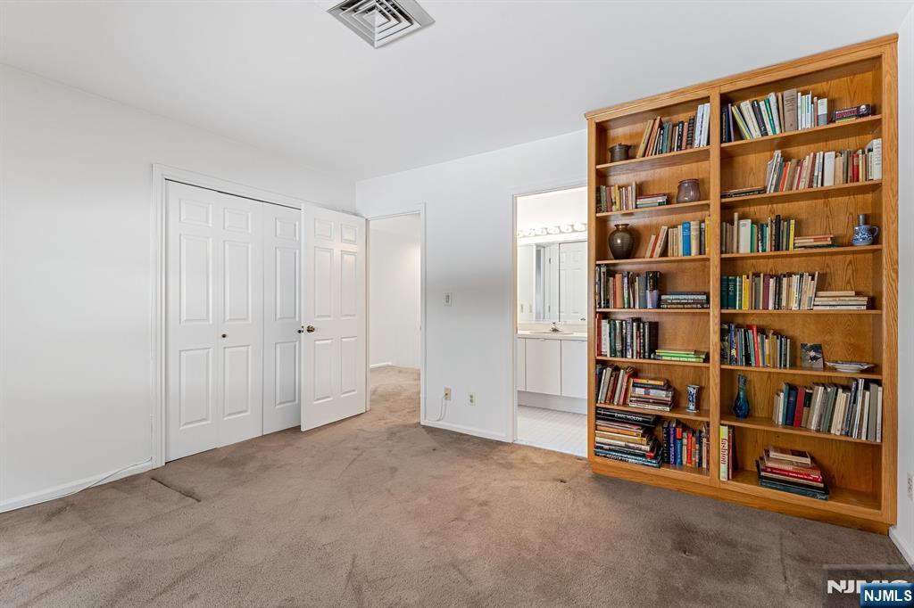 300 Gorge Road, Unit 25 Cliffside Park, NJ 07010 - Photo 20 of 45 a view of an empty room with furniture