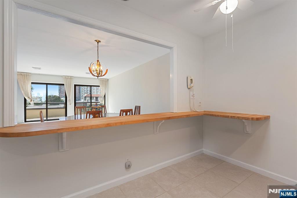 300 Gorge Road, Unit 25 Cliffside Park, NJ 07010 - Photo 5 of 45 an empty room with windows