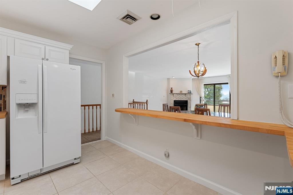 300 Gorge Road, Unit 25 Cliffside Park, NJ 07010 - Photo 9 of 45 a view of a kitchen from the hallway