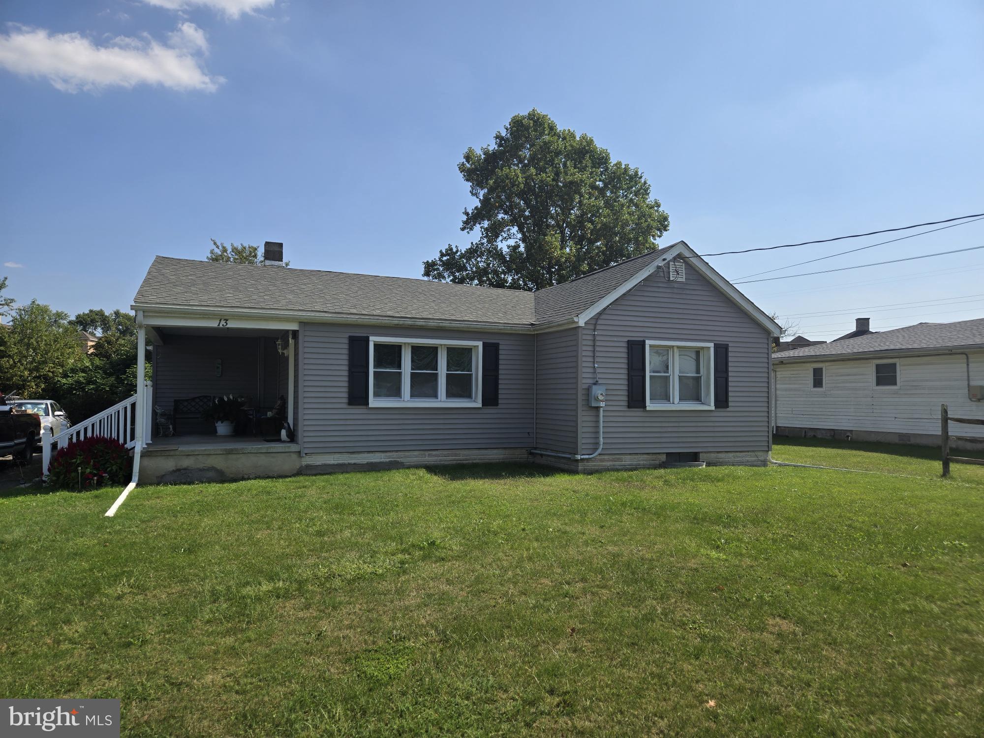 a house view with a garden space