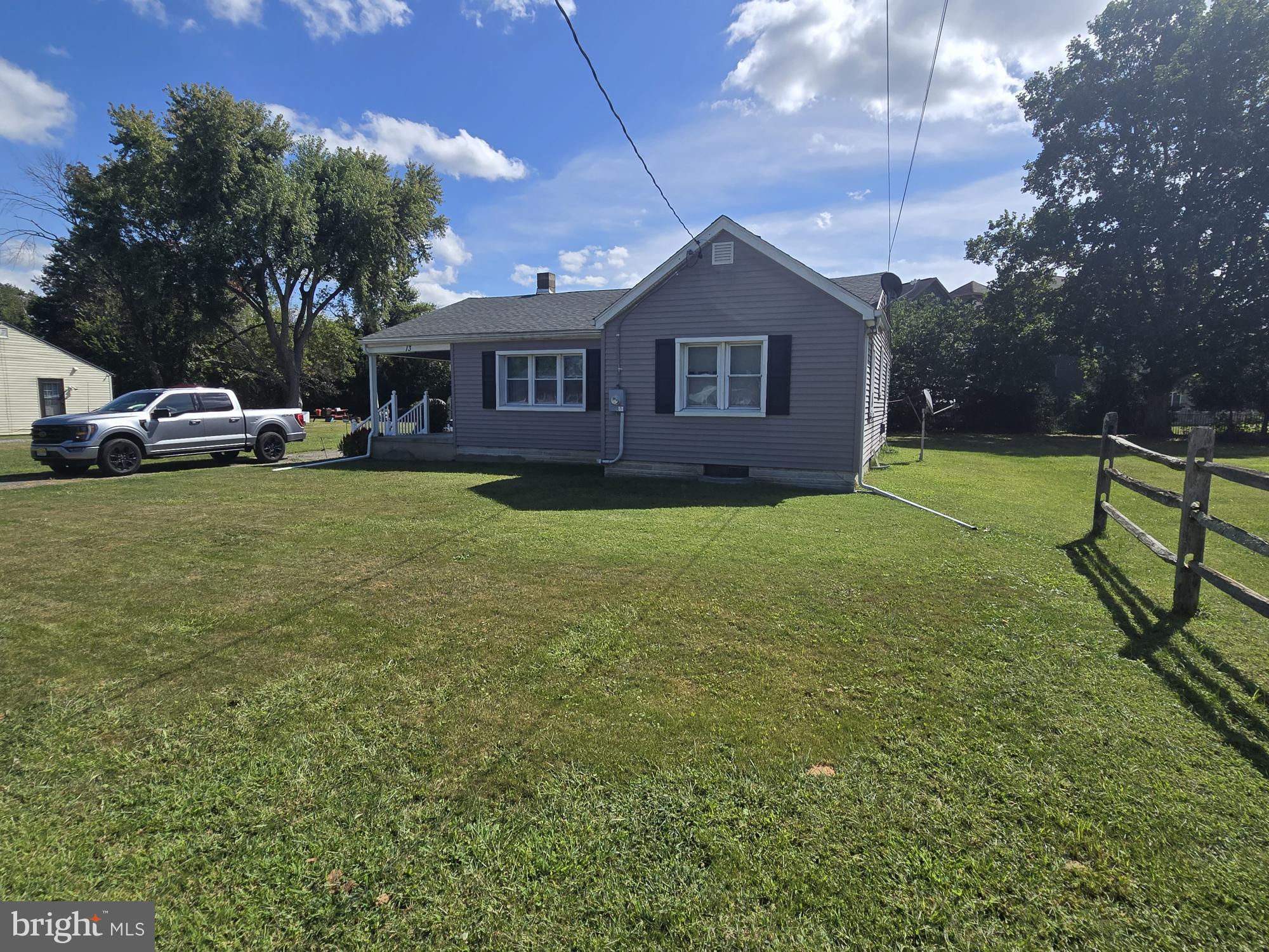 13 Alloway Road Woodstown, NJ 08098 - Photo 11 of 11 a front view of a house with garden