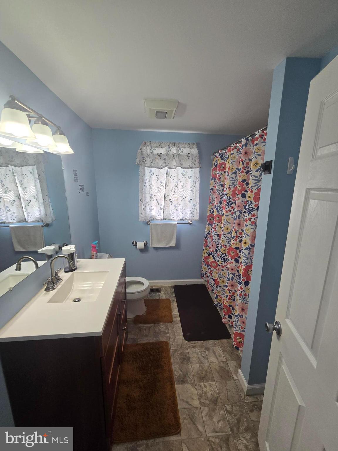 13 Alloway Road Woodstown, NJ 08098 - Photo 7 of 11 a bathroom with a sink and a mirror
