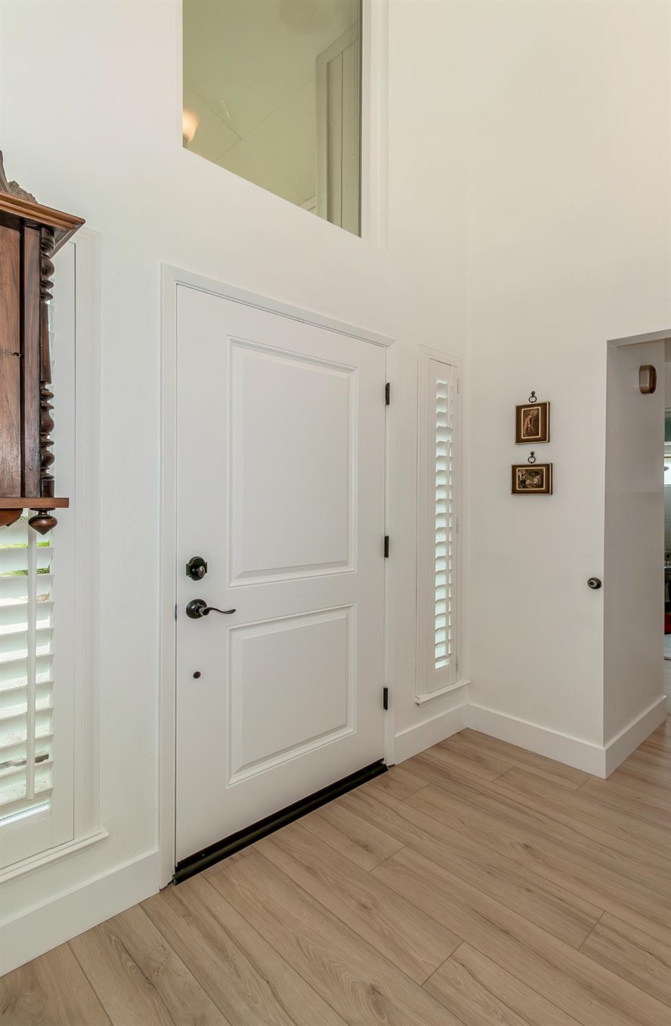 1930 Cougar Lane Clovis, CA 93611 - Photo 2 of 34 an empty room with wooden floor