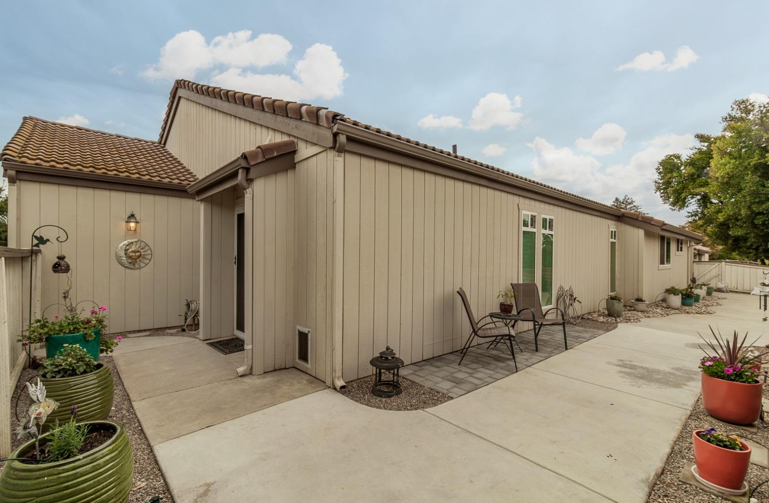 1930 Cougar Lane Clovis, CA 93611 - Photo 24 of 34 a backyard of a house with seating space