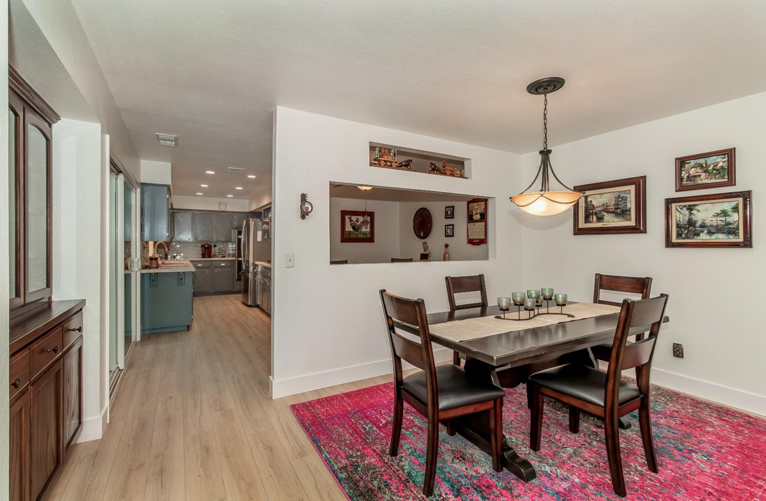 1930 Cougar Lane Clovis, CA 93611 - Photo 6 of 34 a view of a dining room with furniture