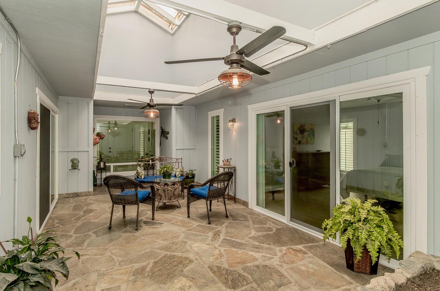 1930 Cougar Lane Clovis, CA 93611 - Photo 8 of 34 a view of a dining room with furniture