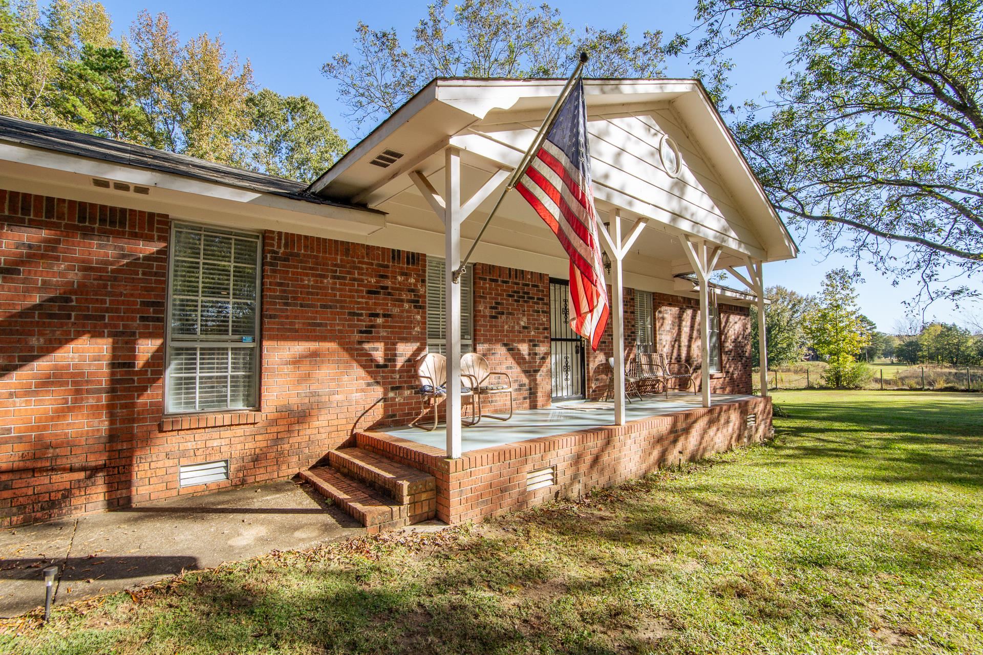 3095 Buster Road Middleton, TN 38052 - Photo 3 of 36 a view of a house with a yard