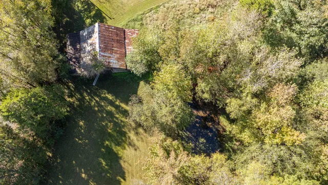 a view of a swimming pool and an outdoor space