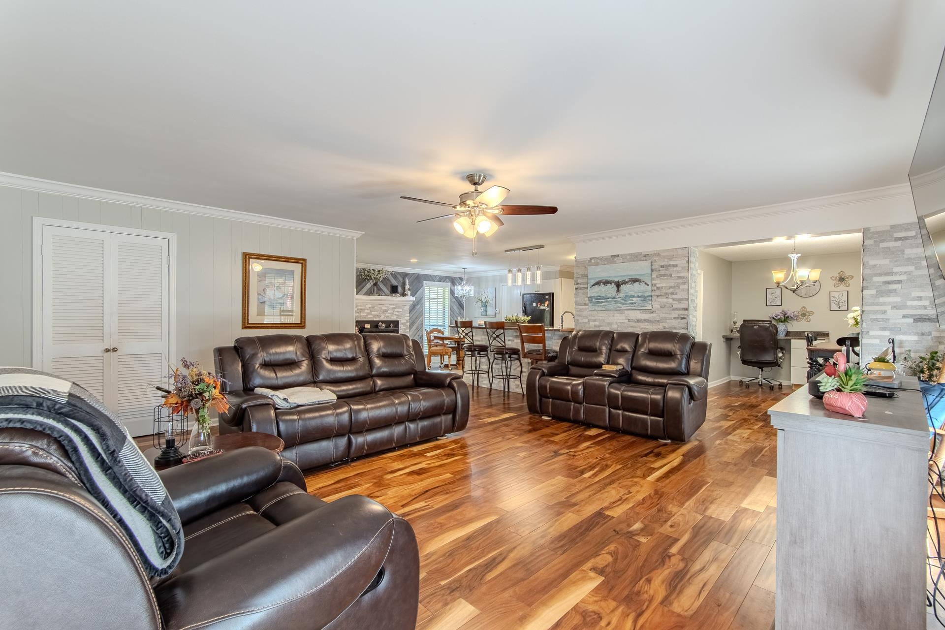 3095 Buster Road Middleton, TN 38052 - Photo 5 of 36 a living room with furniture and a chandelier