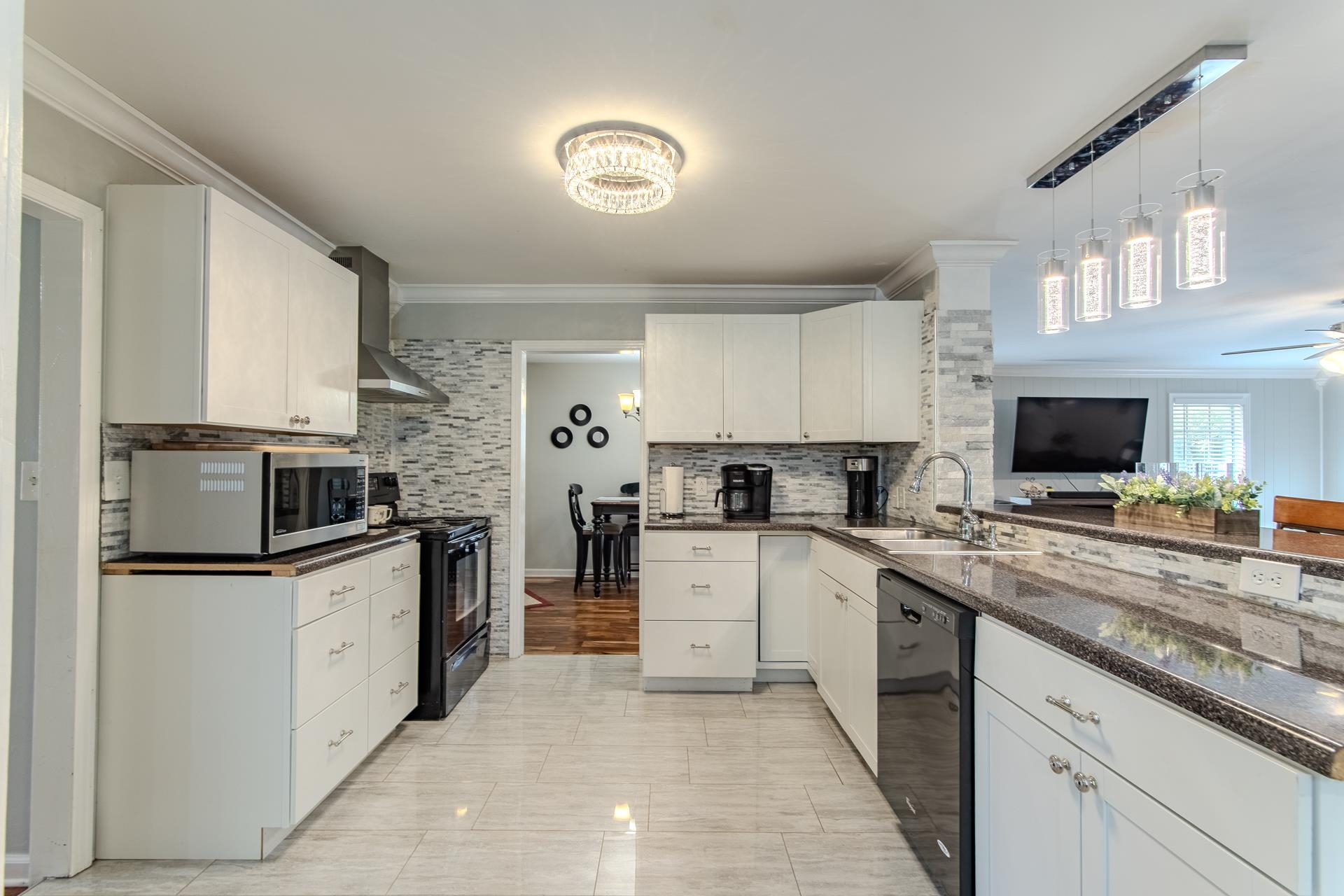 3095 Buster Road Middleton, TN 38052 - Photo 8 of 36 a kitchen with cabinets stainless steel appliances and a counter top space
