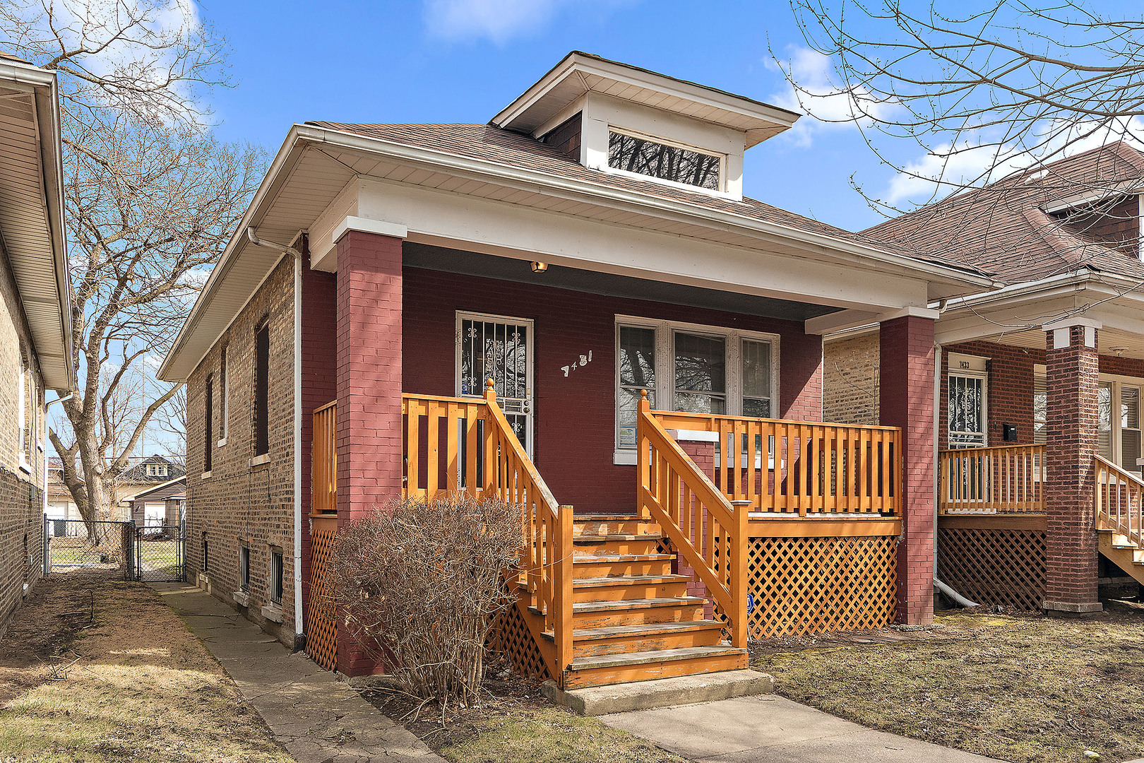 7431 South Perry Avenue Chicago, IL 60621 - Photo 1 of 14 a front view of a house