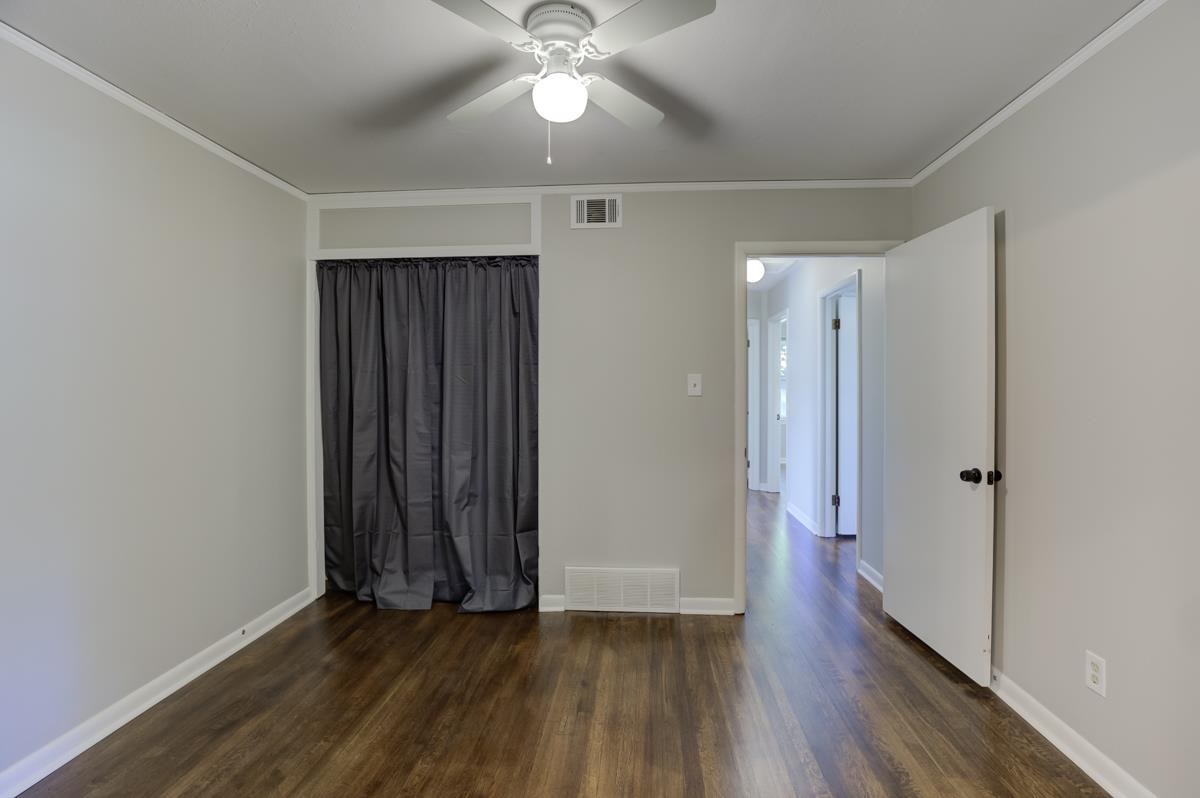 1738 Capri Road Memphis, TN 38117 - Photo 14 of 24 You can close off door to kitchen and other door leads to hallway with Bookcase