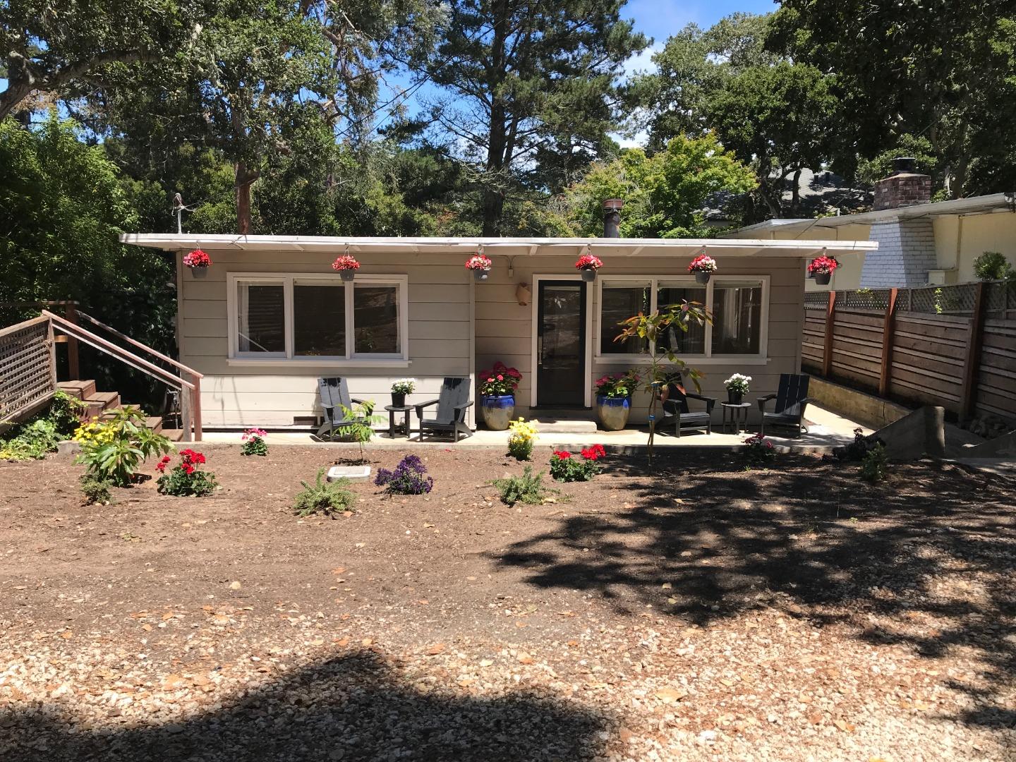 a view of a backyard with a patio