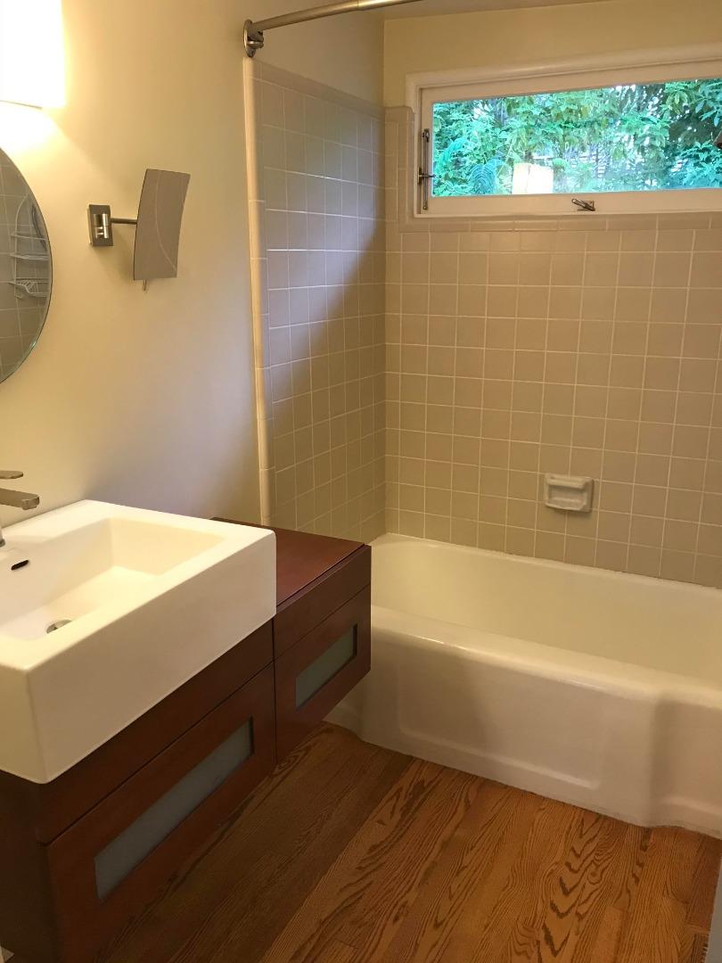 3-12th Junipero Avenue Carmel, CA 93923 - Photo 12 of 14 a bathroom with a bathtub and a sink