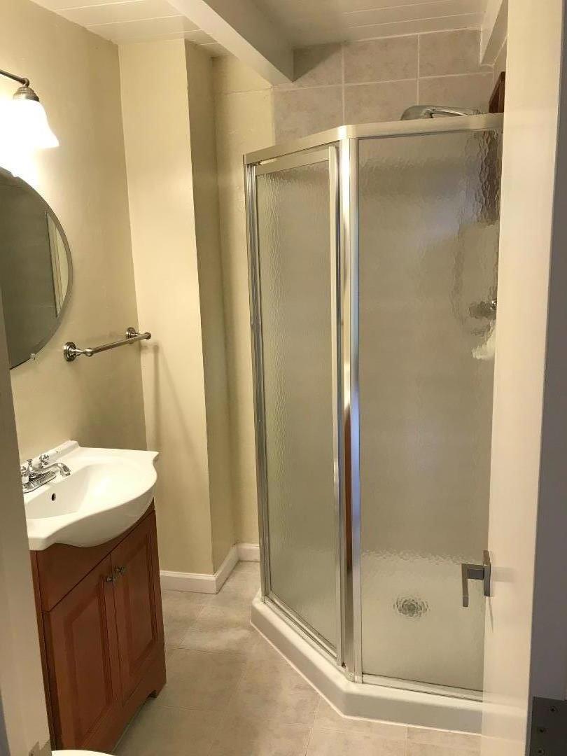 3-12th Junipero Avenue Carmel, CA 93923 - Photo 9 of 14 a bathroom with a shower and a sink