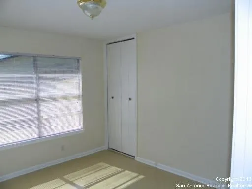 a view of an empty room with window
