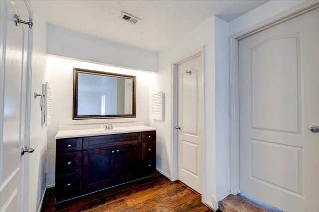 a view of small space with racks on the wall